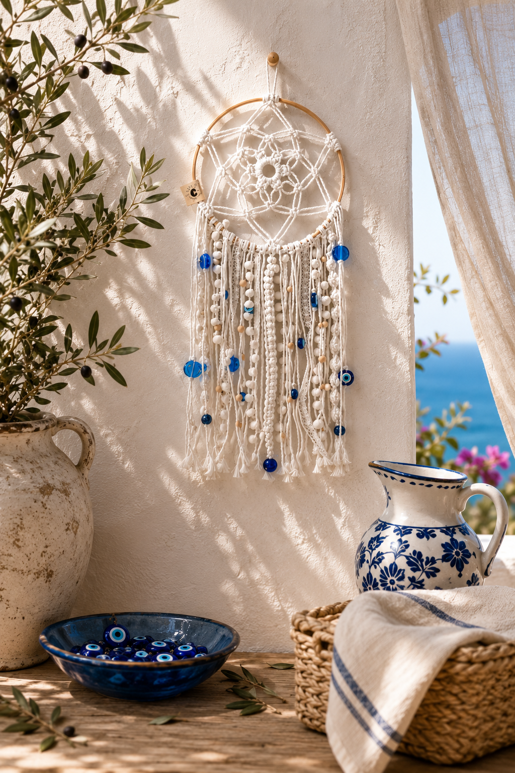 Decorative dreamcatcher with blue beads on a wall with natural light and outdoor view.